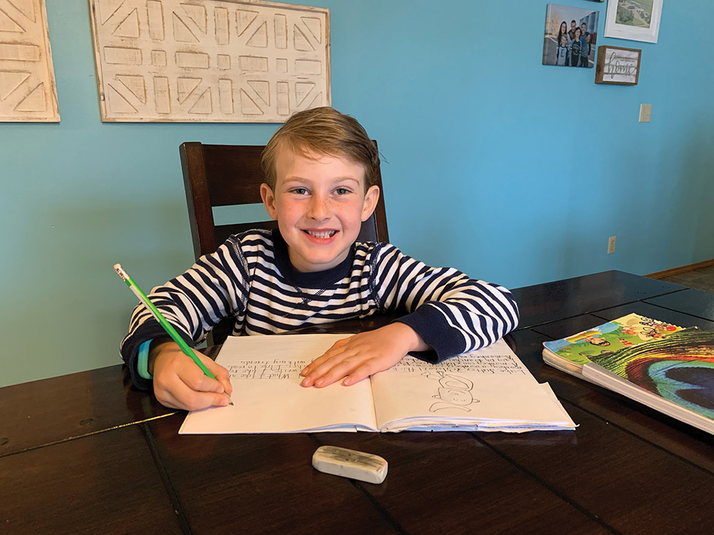 Luke Sutter spends some time at the kitchen table to complete his home