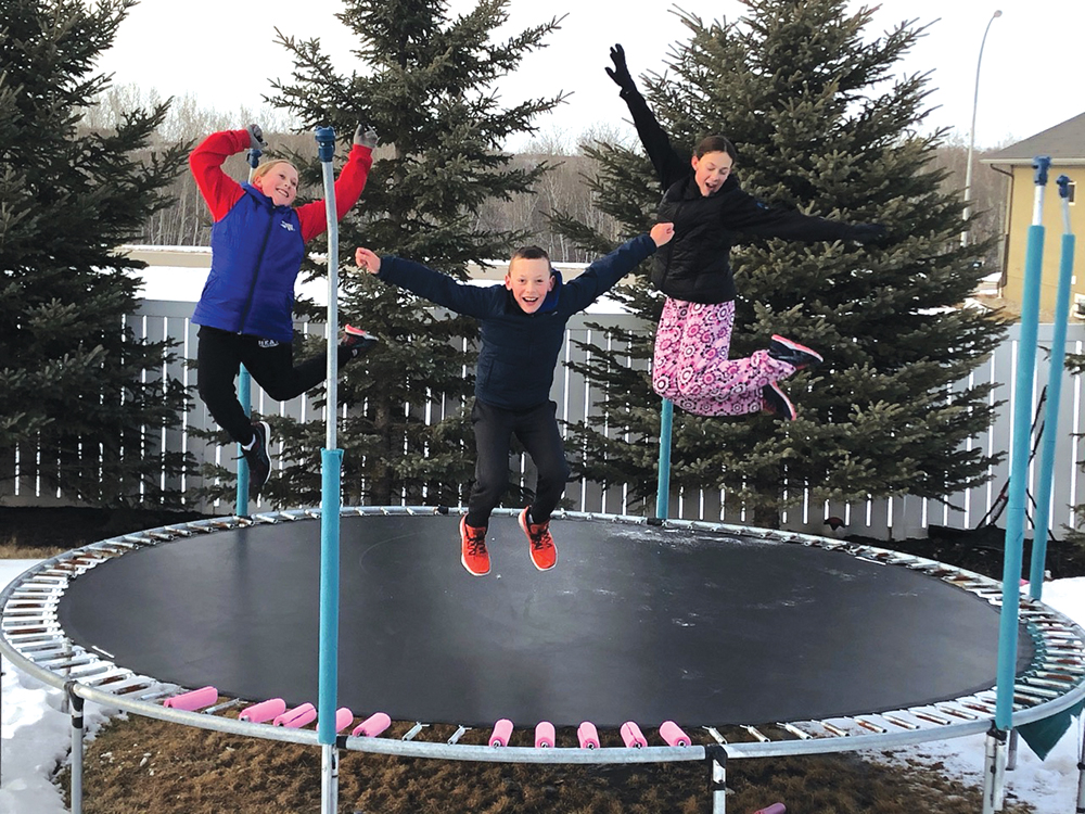 The Unchulenko family from Esterhazy enjoys some outdoor time on the trampoline in their yard while at home during the Covid-19 shutdowns.