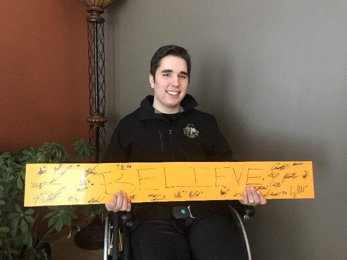 Morgan Gobeil with the Believe sign Humboldt Broncos Assistant Coach Chris Beaudry brought to the hospital in Saskatoon just days after the accident. The sign stayed at the hospital until the last boyMorgan came home, just as Beaudry intended.