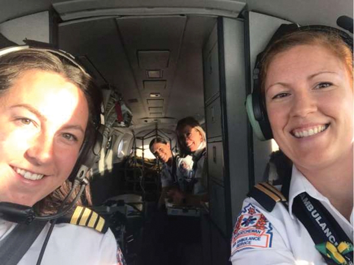 Carly St Onge (left) Tammie Kulyk, Jen Rondeau and Crystal Lybeck (very back) fly the first all-female crew Saskatchewan Air Ambulance flight Friday.