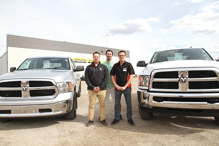 Above: Austin Vargo, Marcel Legault, and Tim Kaban with some of the vehicles they are selling at Whitewood Dodges off-site sales office in Moosomin. Starting this Wednesday, Whitewood Dodge will have a salesperson operating out of the Mazergroup location in Moosomin. Once Mazergroup completes its new building, a new Chrysler Dodge dealership will be developed.