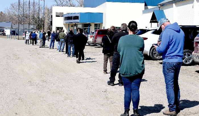 Dozens lined up outside the Moosomin Communiplex to receive a dose of the AstraZenica COVID-19 vaccine on Wednesday, April 21.