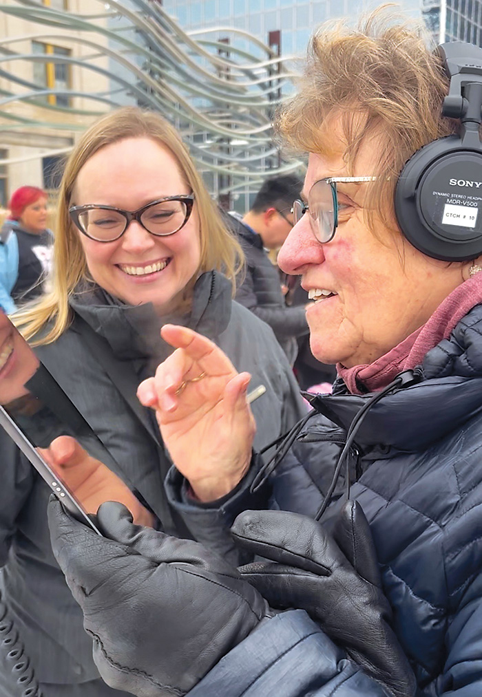 Kadence Merediths Mom, Sherrie Meredith, and Grandma, Hertha Briggs, checking out her Augmented Reality installation at Frost Regina.