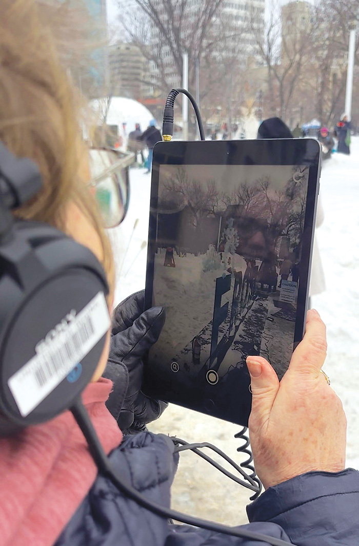 Kadence Merediths Mom, Sherrie Meredith, and Grandma, Hertha Briggs, checking out her Augmented Reality installation at Frost Regina.