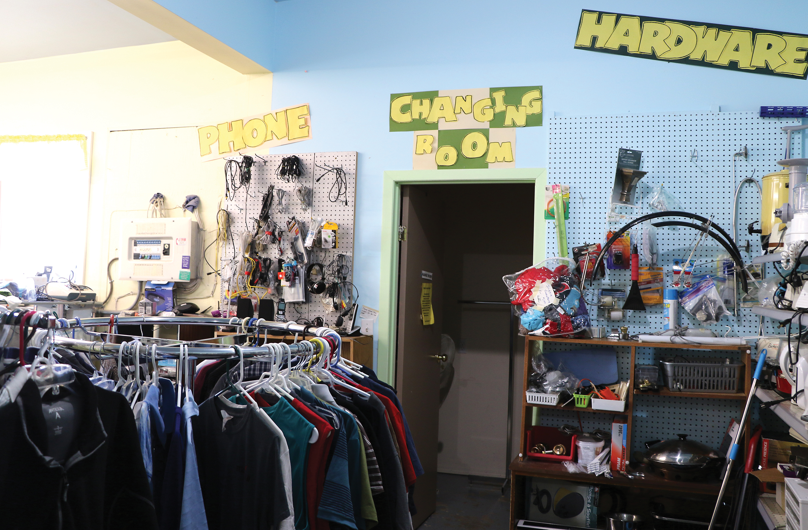 The clothing, phone and hardware section of Rocanvilles and Community Thrift Store.