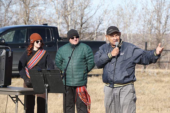 Left are, Solange Simard and Principal Richard Fiola of cole Saint-Lazare, and President of MMF Fort Ellice Terry Haney.