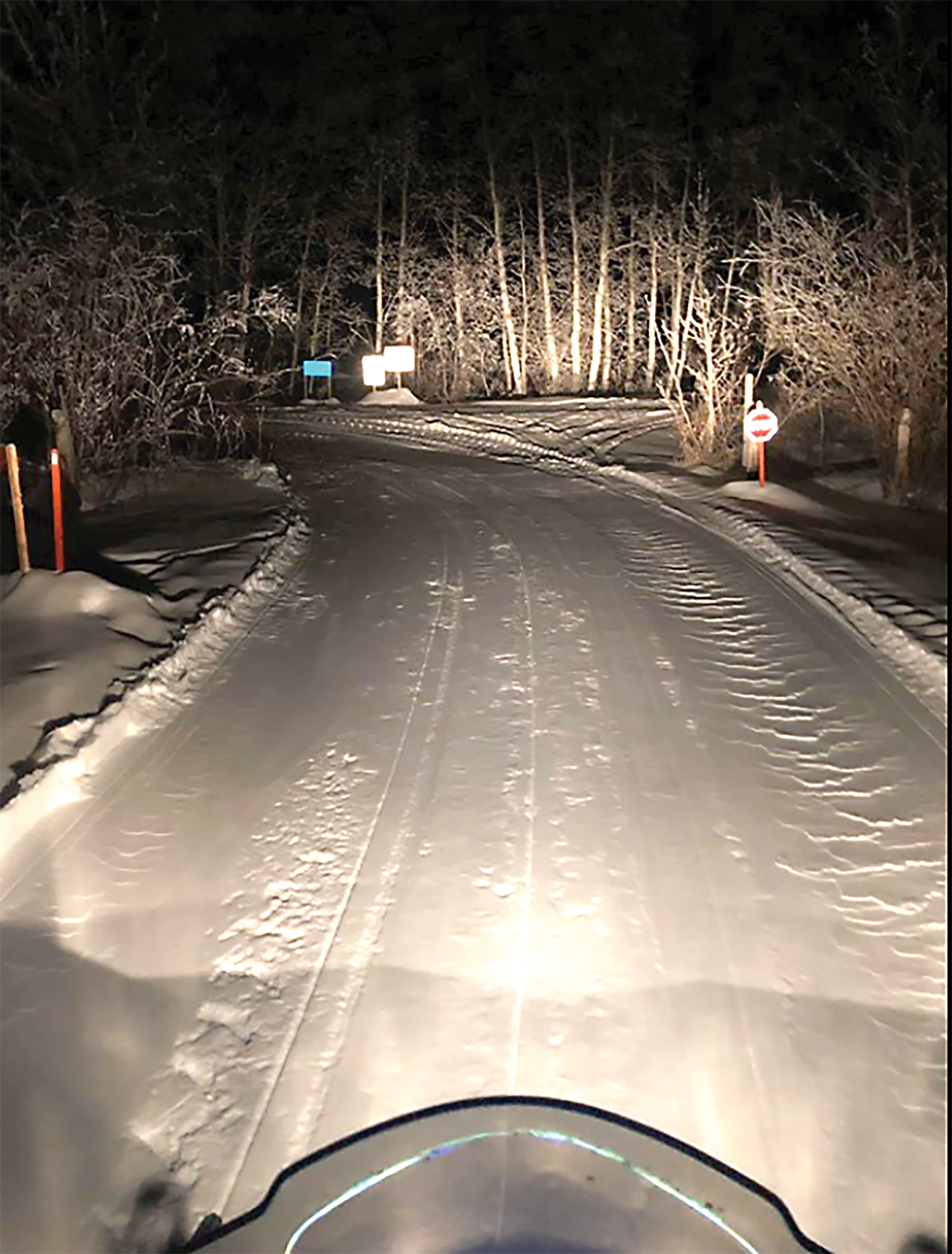Snowmobiling the Tri Valley Trails at night. Photo by Stan Langley.