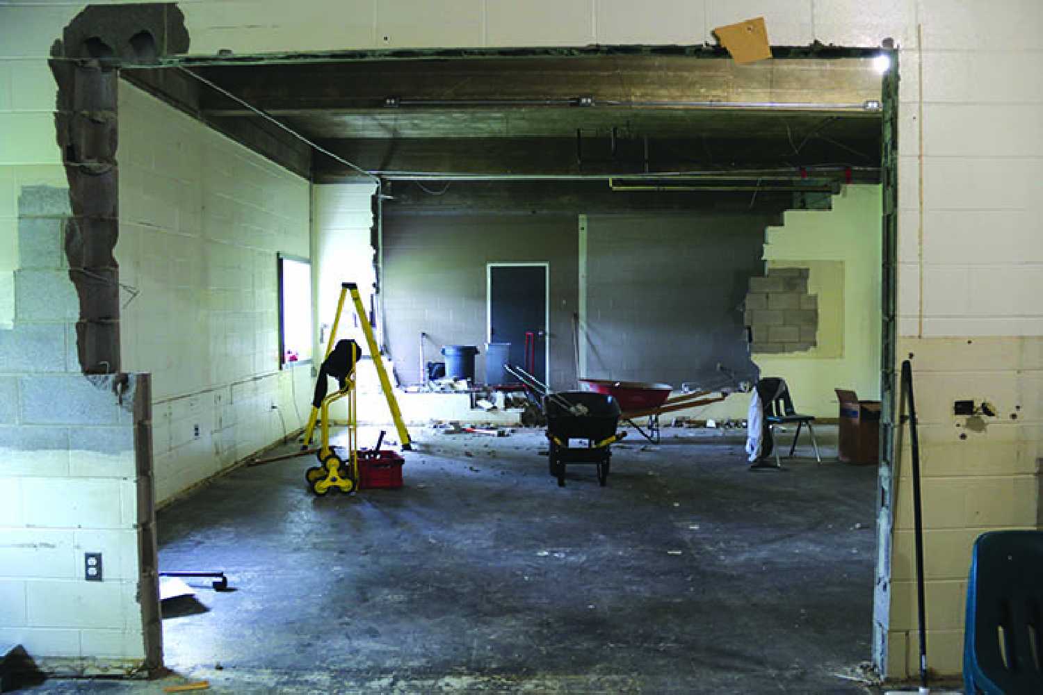 McNaughton High School  begins demolition in Home Ec lab.