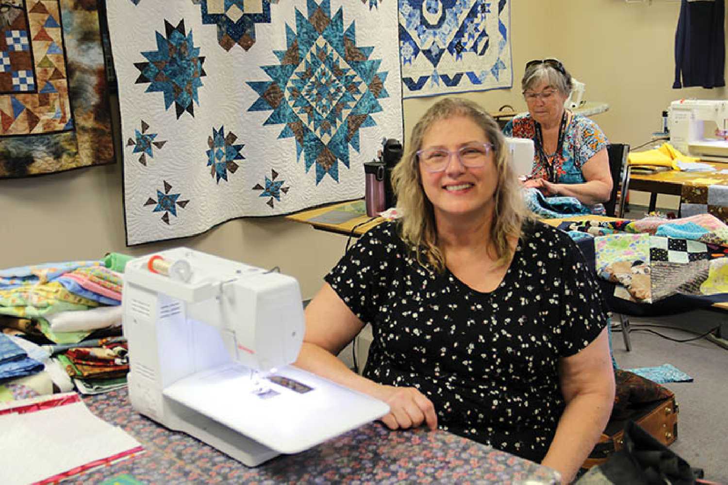 Tanya Cestnick working on a quilt for a Jasper family.