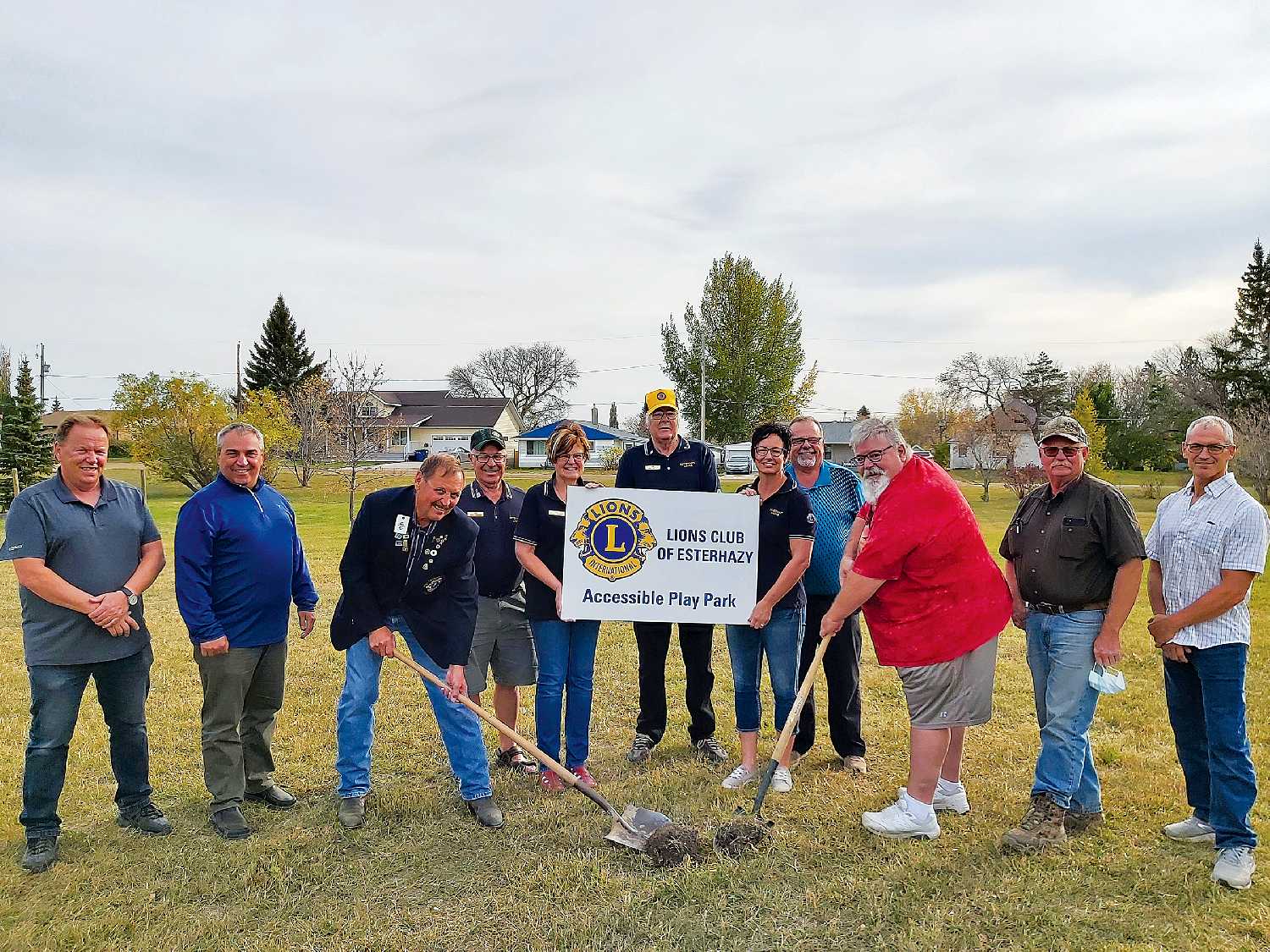 On Wednesday, the sod turning was held for the new accessible play park being installed at the Esterhazy Historical Park. The play park is being funded by the Estehrazy Lions Club and by the town. From left are Town Councilor Vern Petracek, Town Administrator Mike Thorley, Lion Dan Babyak, Lion Harold Esslinger, Lion Audrey Petracek, Lion Jon Simpson, Lion Brenda Redman, Rec Director Garth Forster, Mayor Grant Forster, Town Councilor Earl Nickell and Town Councilor Marty Pfeifer.