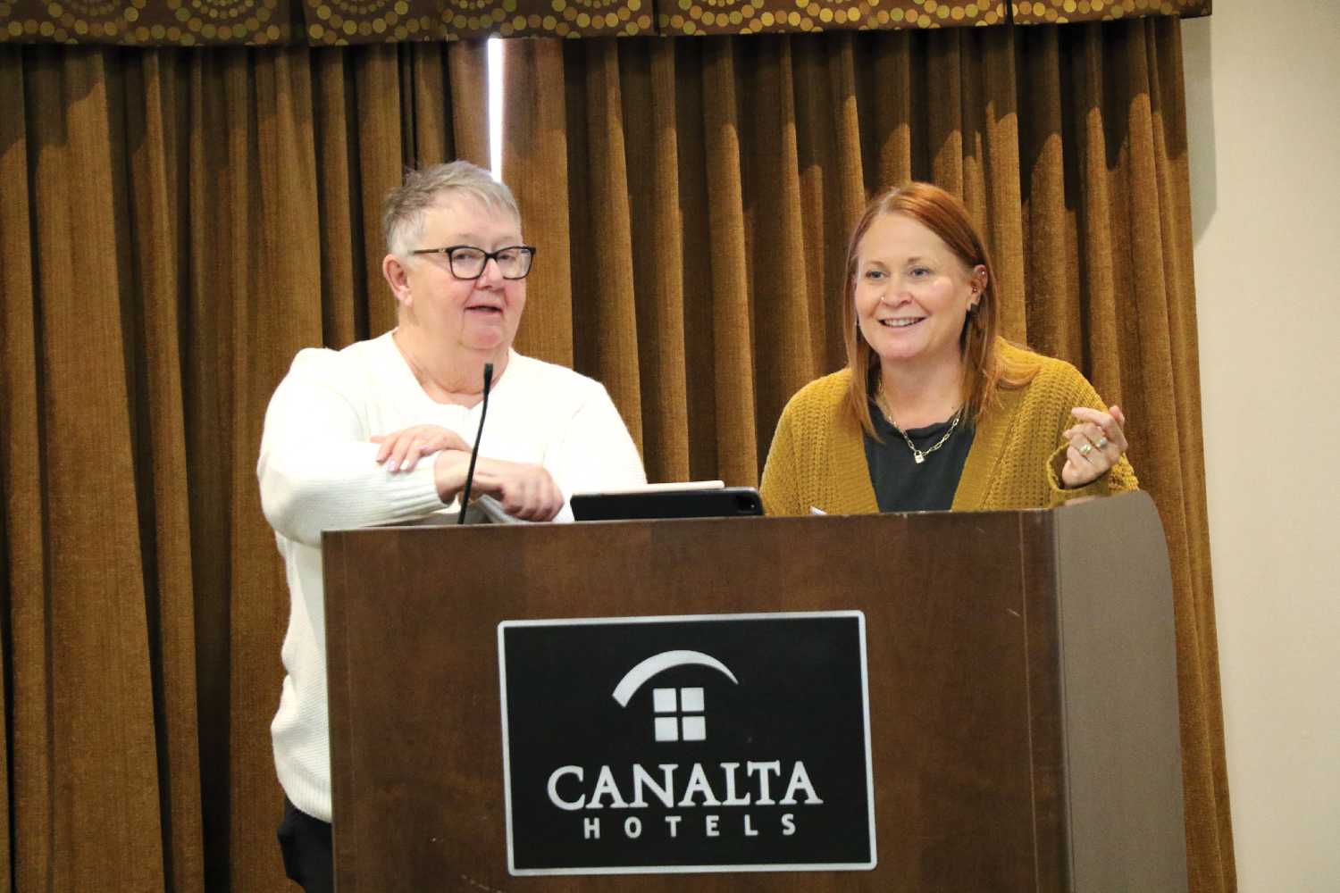 Carol Fawcett and Angela Thorn of Moosomin’s Communities in Bloom Committee speaking at the Chamber meeting Tuesday.
