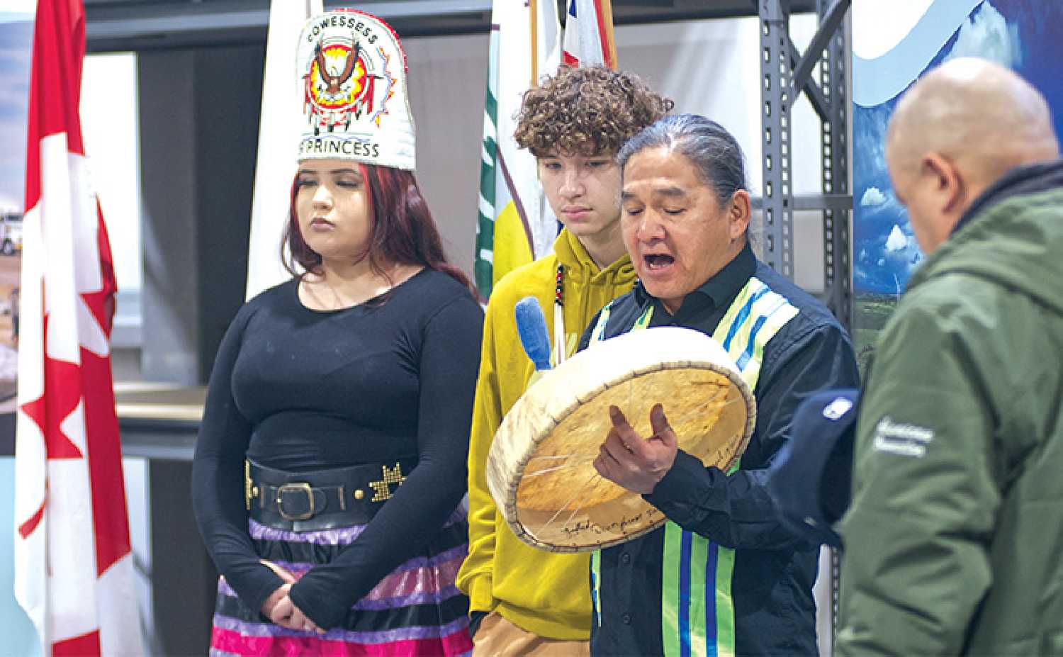 Mike Dejarlais (right) sang a few honour songs during the grand opening of the Bekevar Ytin Wind Energy Project on Nov. 14 Hes joined by (from left) Cowessess Senior Princess, Mimikwas cikaht and Senior Warrior Kestin Delorme.