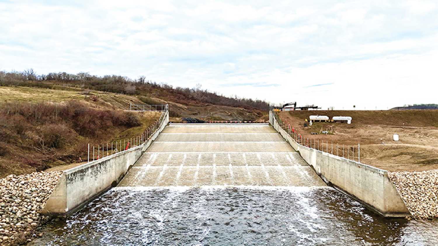 The installation of the concreted slab on the spillway of Moosomin Dam has been completed in time for spring runoff.