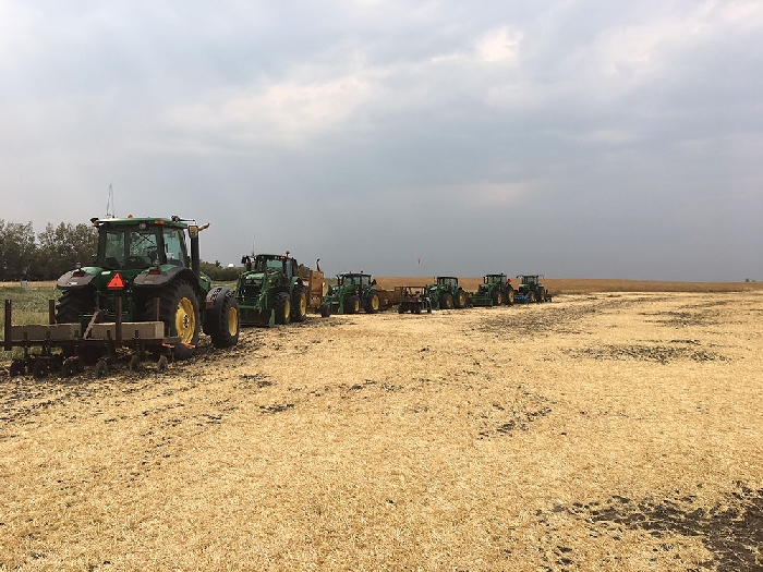 Pictured above is Enbridge laying down straw as part of earlier Line 3 right-of-way reclamation work in southern Saskatchewan.