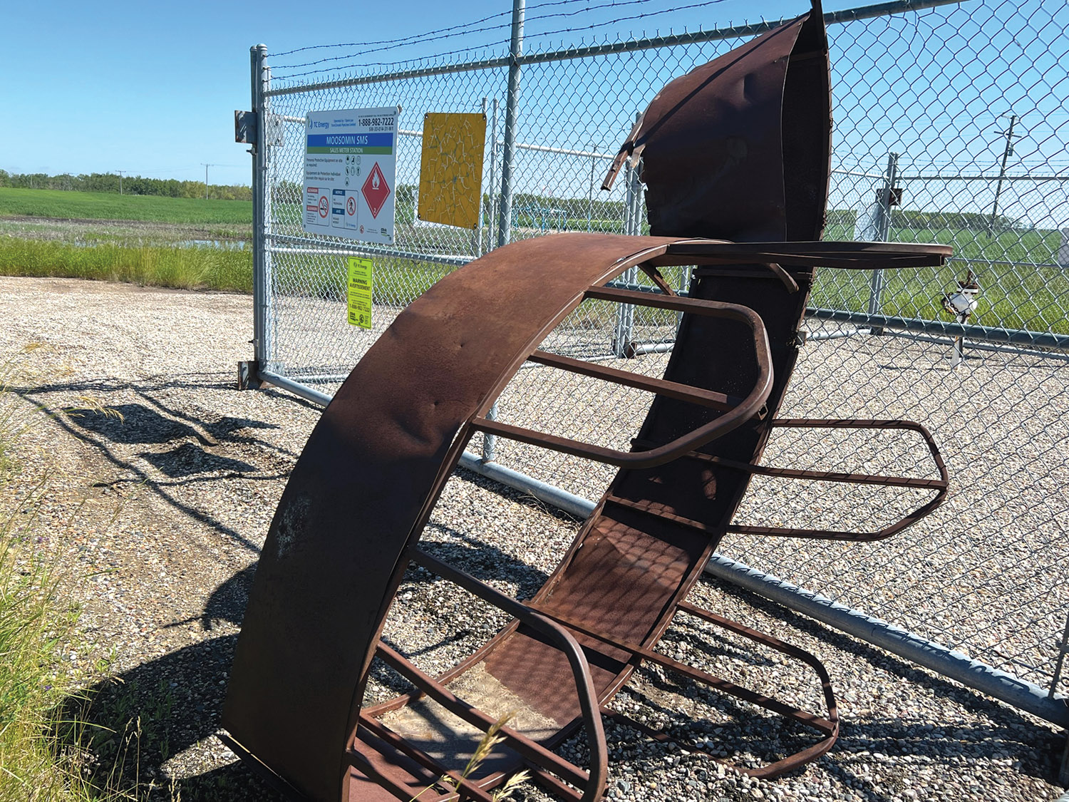 A bale feeder mashed against a fence on Highway 8 north of Moosomin.